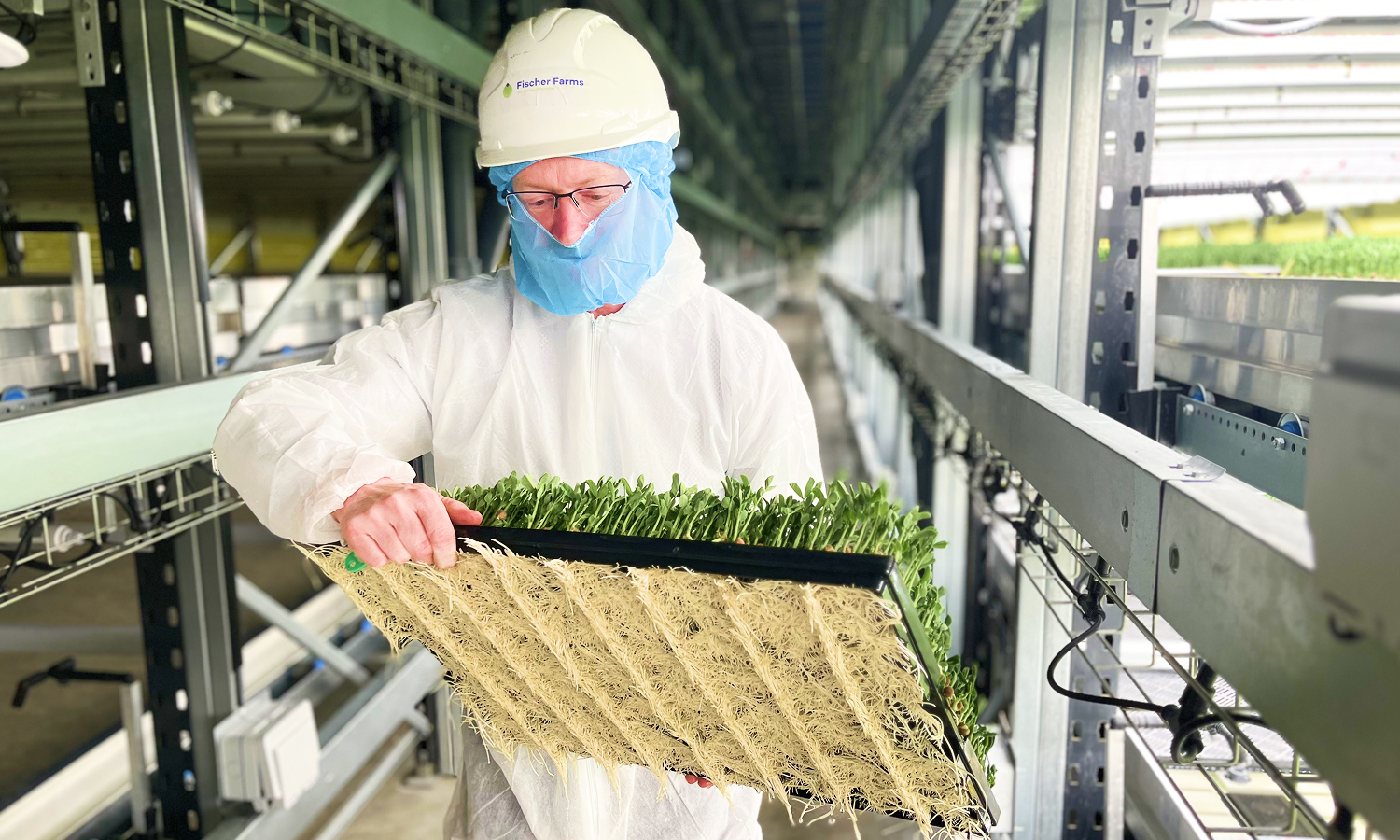 Fischer Farms staff with crop tray